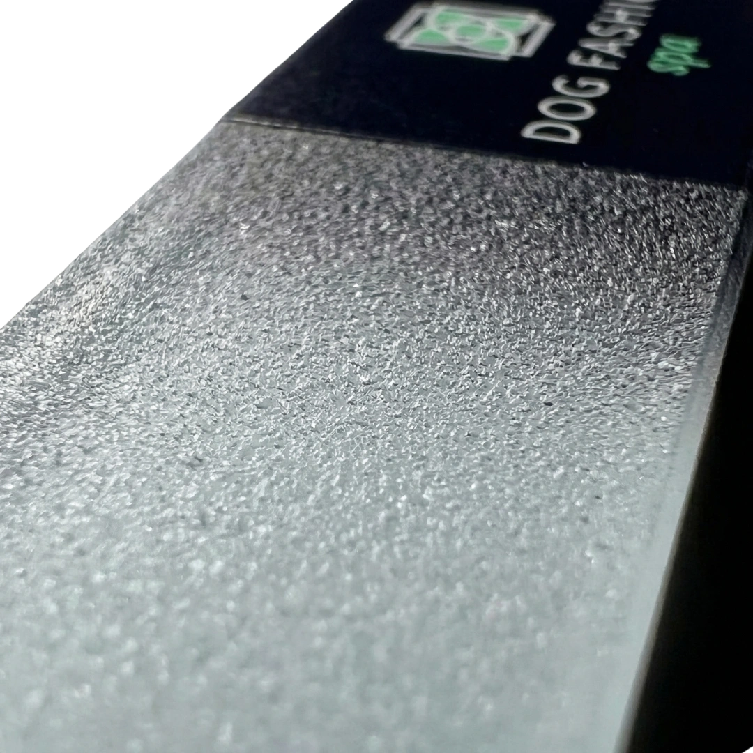 Glass Nail File,"Close-up of textured glass nail file surface"