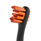 BrushMate Premium Toothbrush with Biteblock,"Close-up of toothbrush head with orange bristles and bite block"