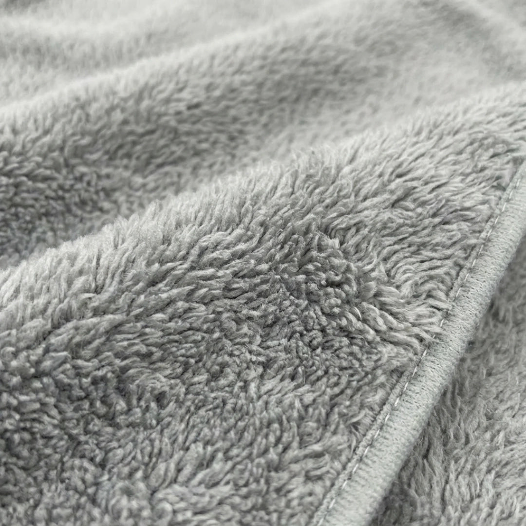 Puppywarmer Fleece Inserts,"Gray fleece fabric close-up with stitched edge"