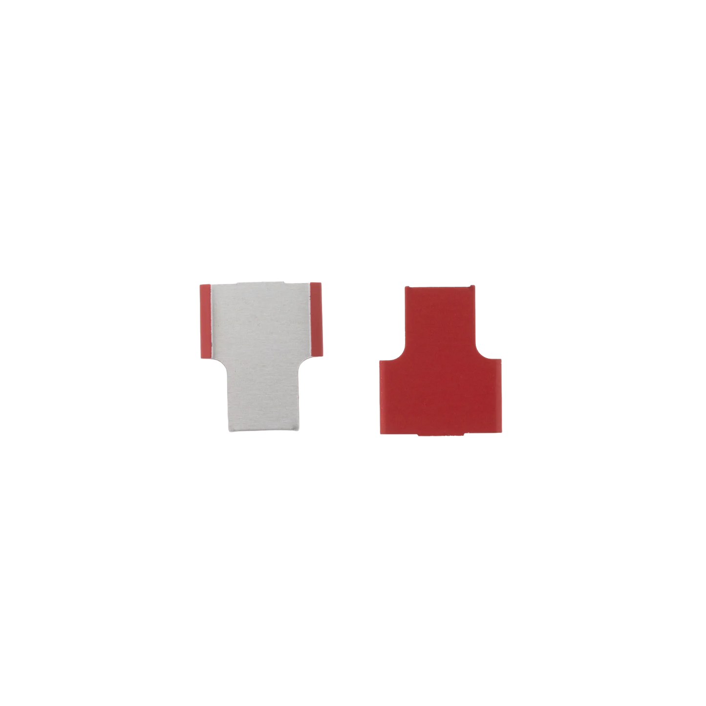 Cane Tabs,"Red and clear cane tab pieces close-up"