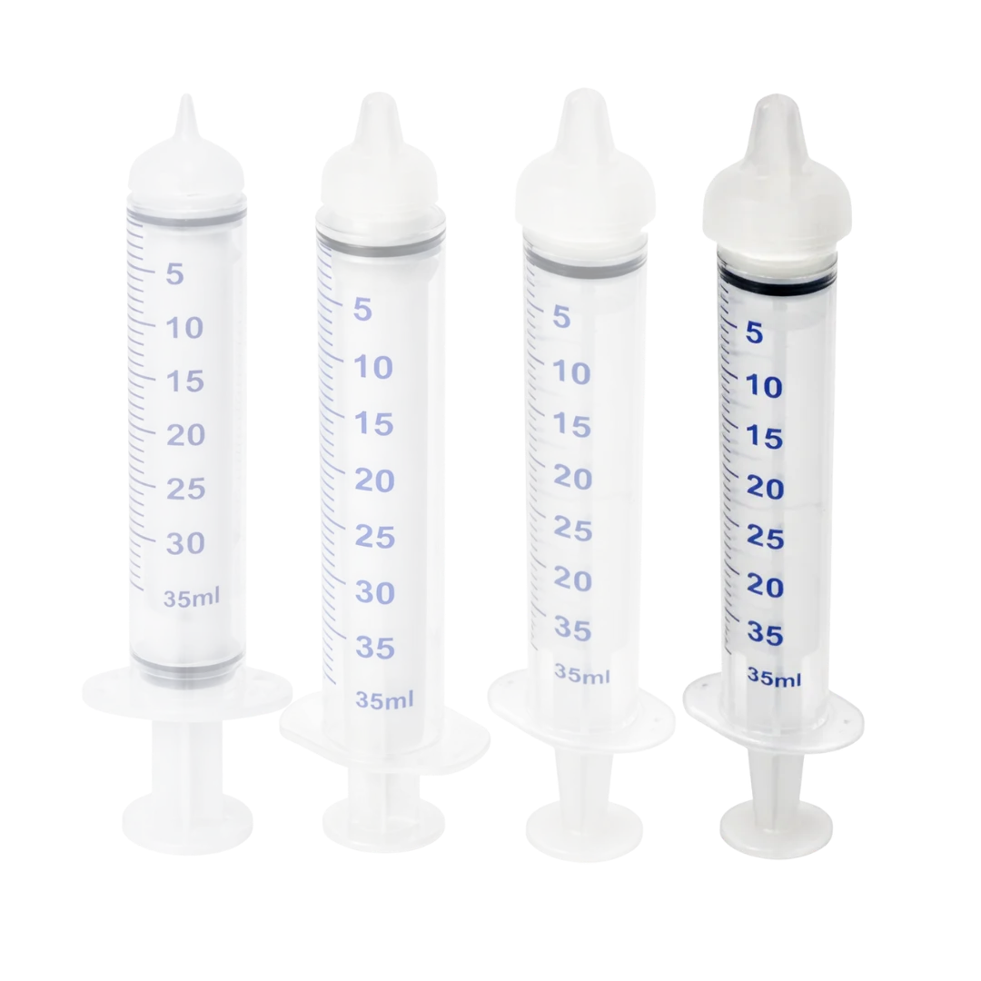 Puppywarmer Bundles,"Set of four clear feeding syringes with white caps"