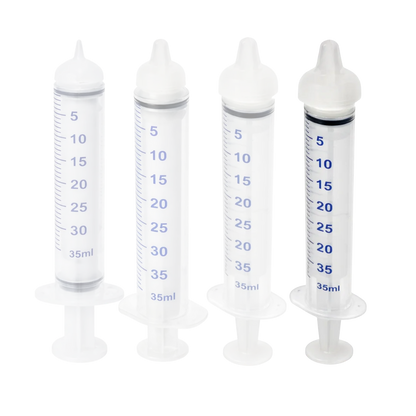 Puppywarmer Bundles,"Set of four clear feeding syringes with white caps"