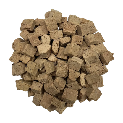 Adventure Fuel: Freeze-Dried Raw Dog Food,"Pile of freeze-dried dog food cubes"