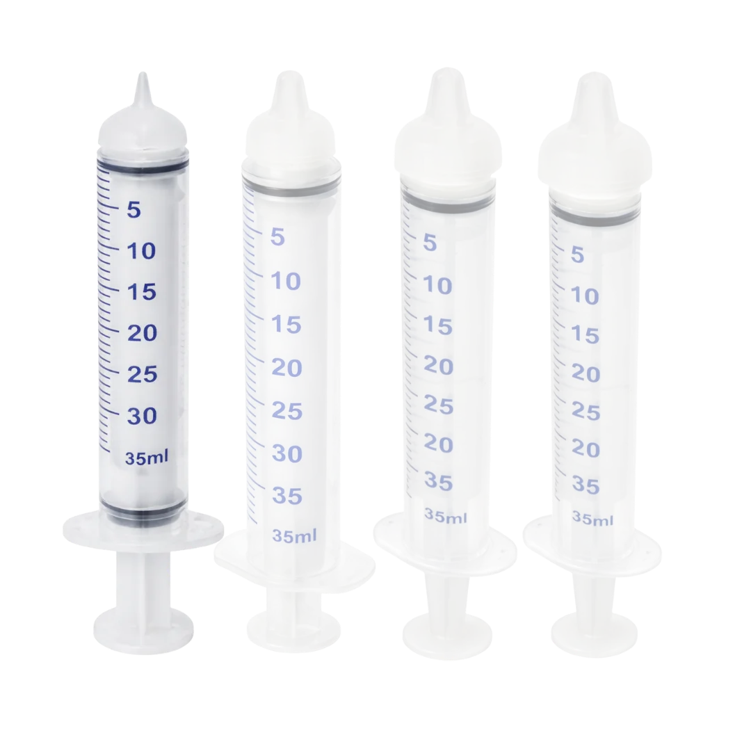 Puppywarmer Bundles,"Set of four clear feeding syringes with white caps"