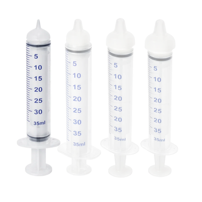 Puppywarmer Bundles,"Set of four clear feeding syringes with white caps"