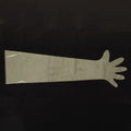 Non Sterile Shoulder Length Glove,"Clear shoulder-length glove with attached sleeve"