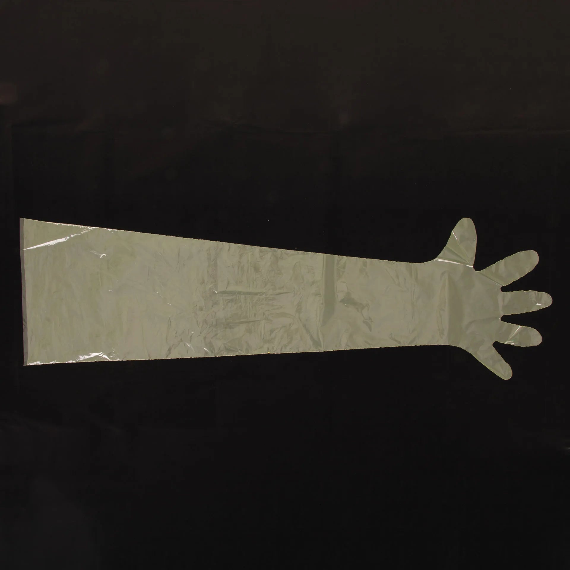 Non Sterile Shoulder Length Glove,"Clear shoulder-length glove with attached sleeve"