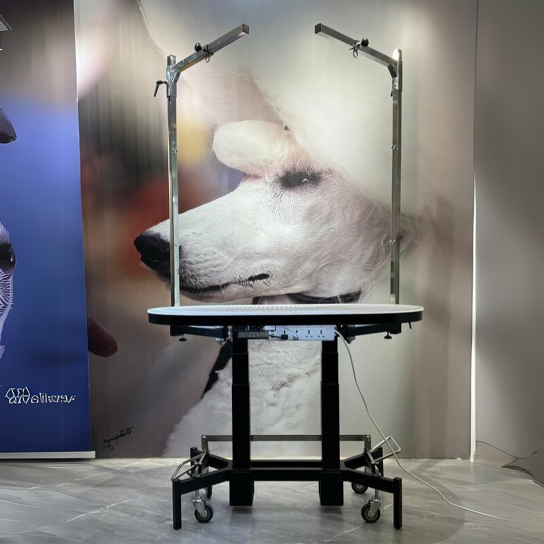 Premium Electric Table by TZGroom,"Electric grooming table with overhead arm and wheeled base"