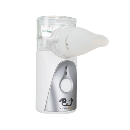 Puppywarmer Handheld Nebulizer,"Handheld nebulizer with clear medicine cup and white mask attachment"