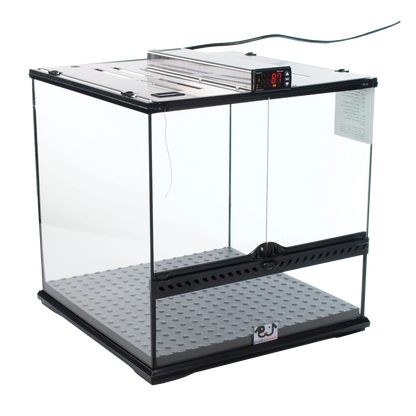 Puppywarmer® Puppy Incubator,"Clear glass incubator with metal top and gray floor mat"
