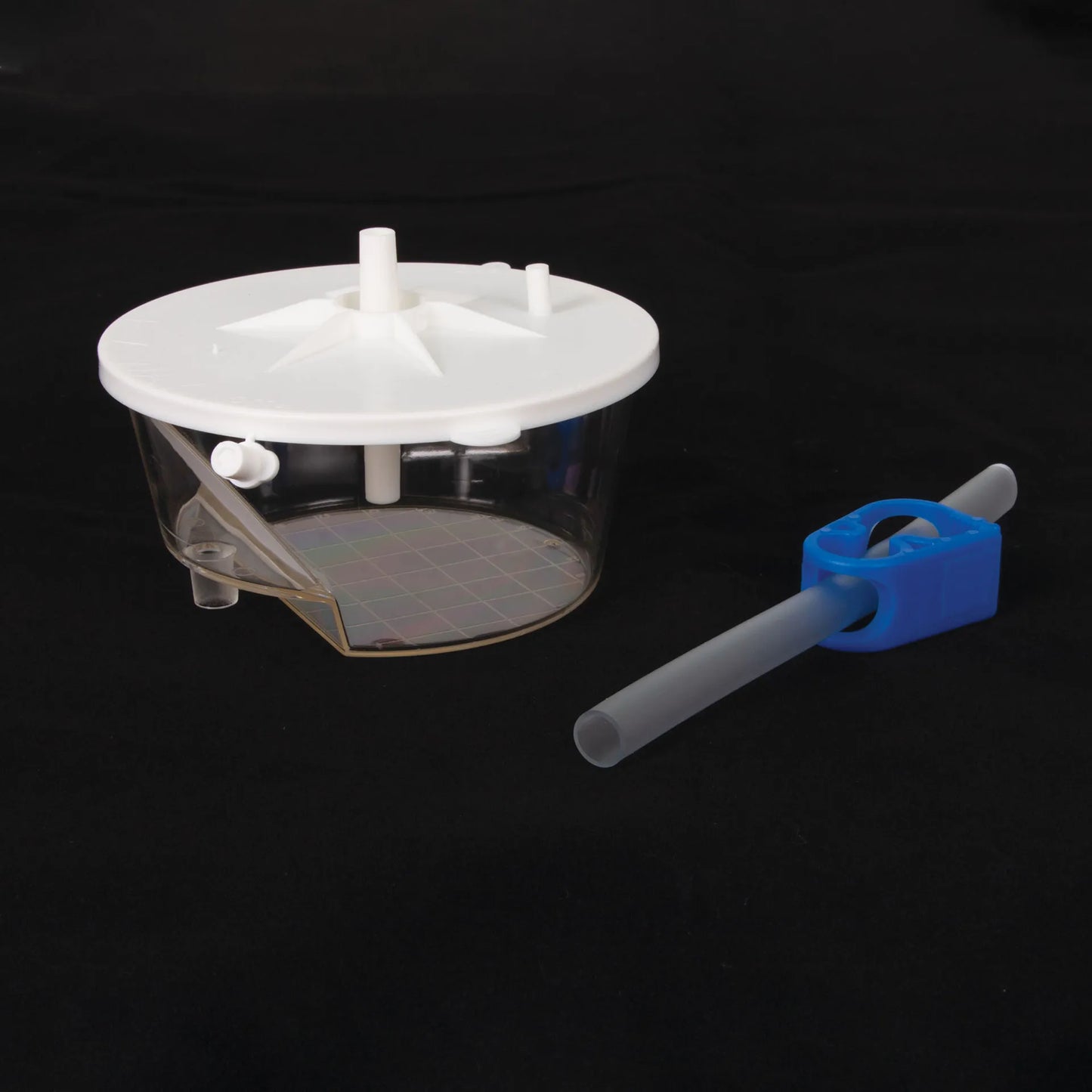EZ Way Filter,"Clear filter chamber with white lid and blue tube clamp"