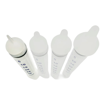 Puppywamer Latchons Syringe Nipple Feeders,"Four clear feeding syringes with white nipple tops"