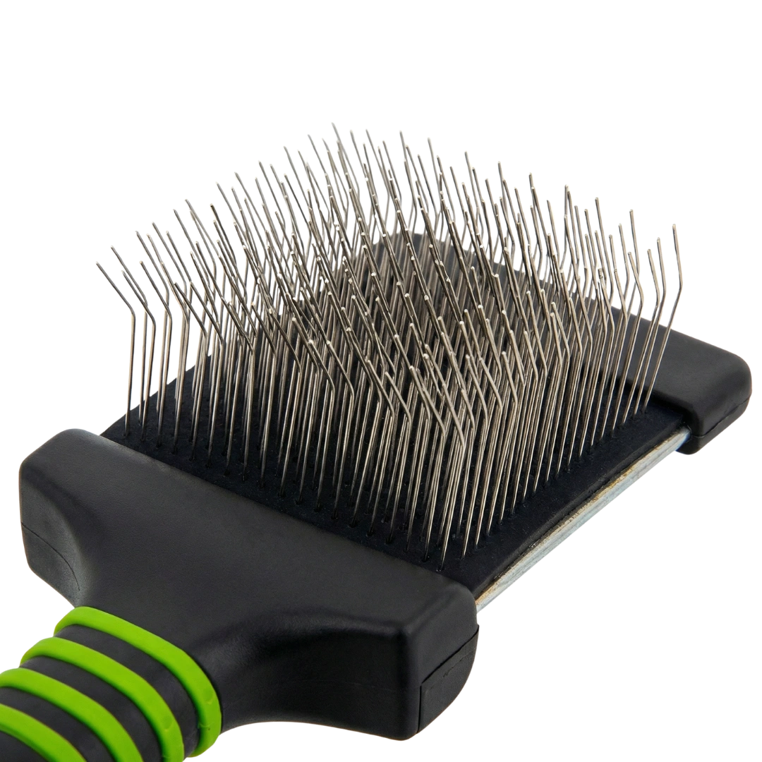 Mini Slicker Brush,"Close-up of brush head with bent metal pins"