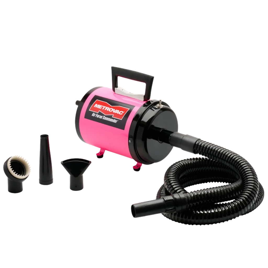 Air Force Commander Two Speed Dryer,"Pink dryer with coiled hose and three nozzle attachments"