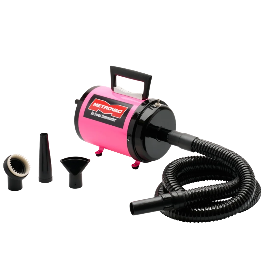 Air Force Commander Two Speed Dryer,"Pink dryer with coiled hose and three nozzle attachments"