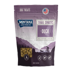 Trail Snacks: Freeze-Dried Raw Dog Treats,"Purple treat bag with clear window showing cube-shaped treats"