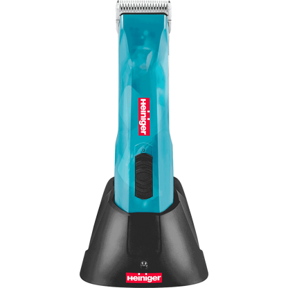 Opal Cordless Clipper and Free Blade,"Blue cordless clipper standing in black charging base"