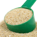 Heiro™,"Green scoop filled with beige granular powder"