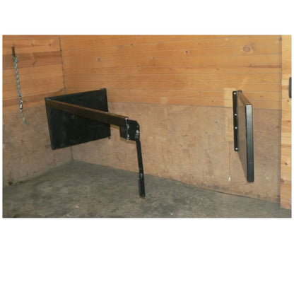 Stall Stocks Uni,"Black fold-down shelf mounted on wood wall"