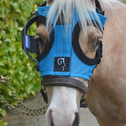 Equilume Light Mask,"Horse wearing blue mesh light mask with side eye cups"