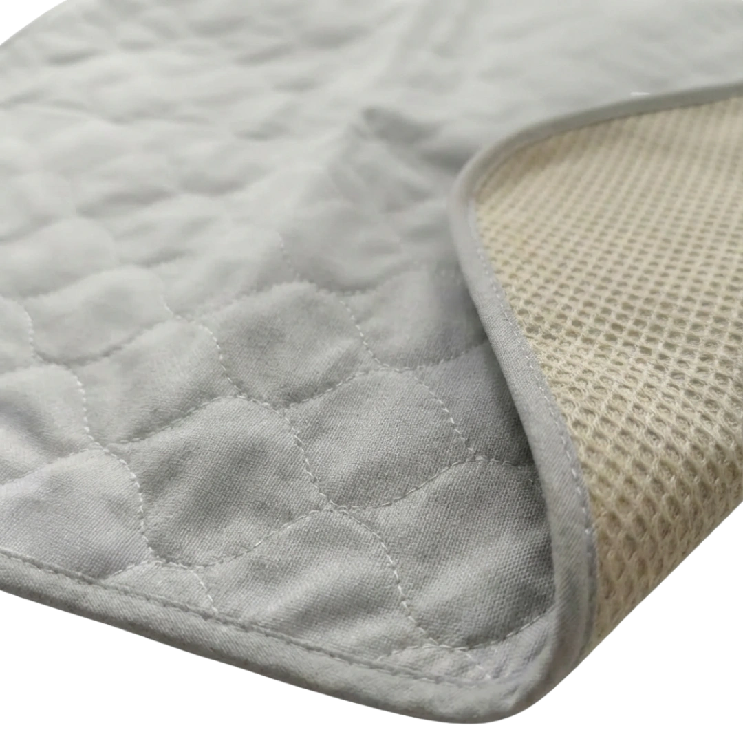 Puppywarmer Incubator Pee Pad,"Quilted pad with textured mesh underside"