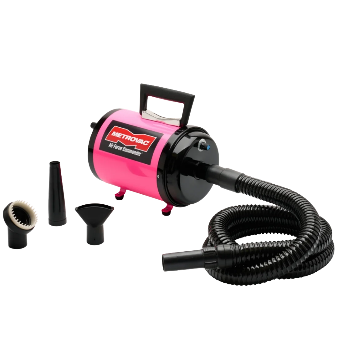 Air Force Commander Variable Speed Dryer,"Pink dryer with coiled hose and three nozzle attachments"
