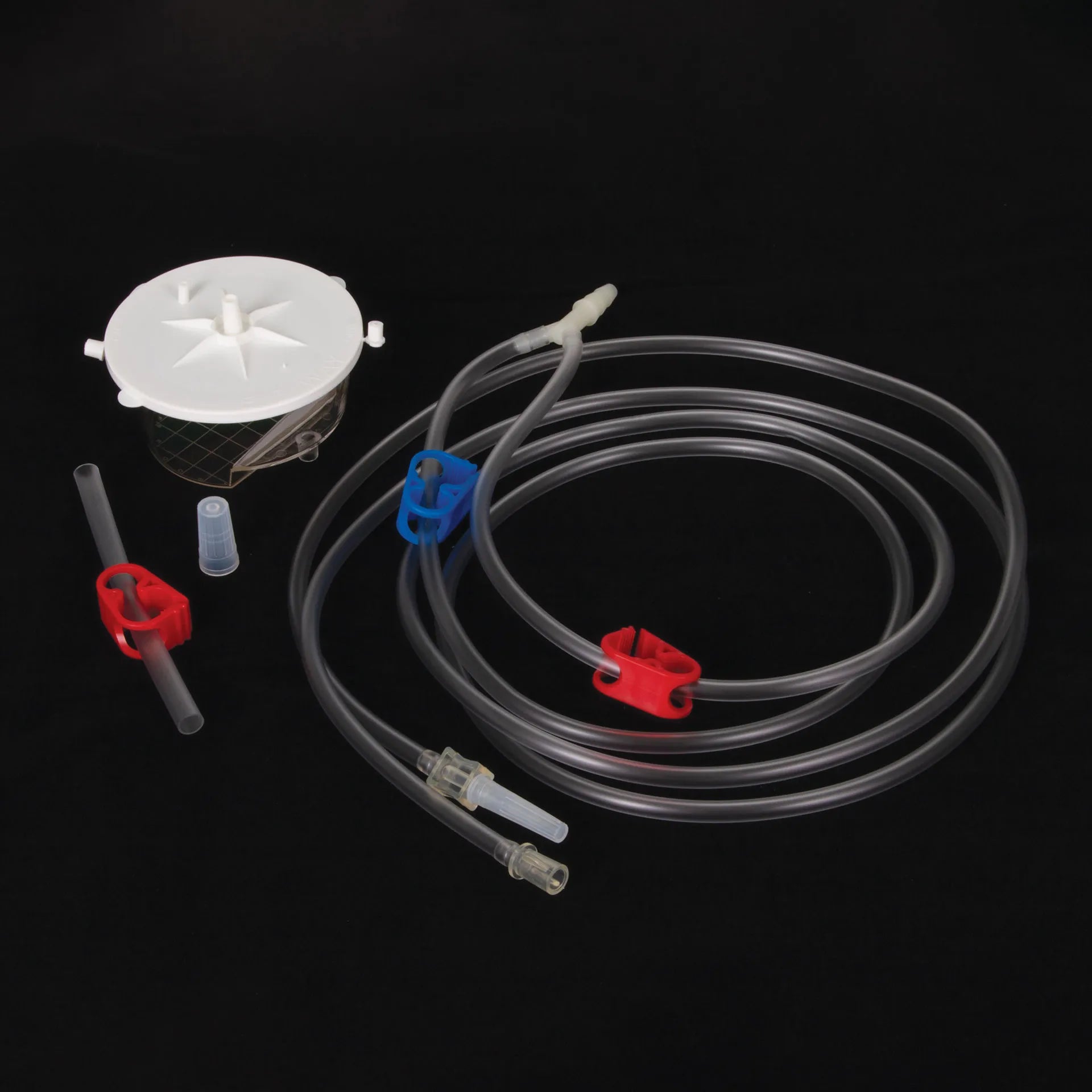 EZ Way Filter with Tubing,"Round filter chamber with clear tubing and red and blue clamps"