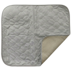 Puppywarmer Incubator Pee Pad,"Quilted gray pad with one corner folded up"