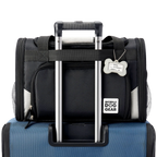 Mobile Dog Gear Pet Carrier Plus,"Black pet carrier attached to luggage handle with bone-shaped ID tag"