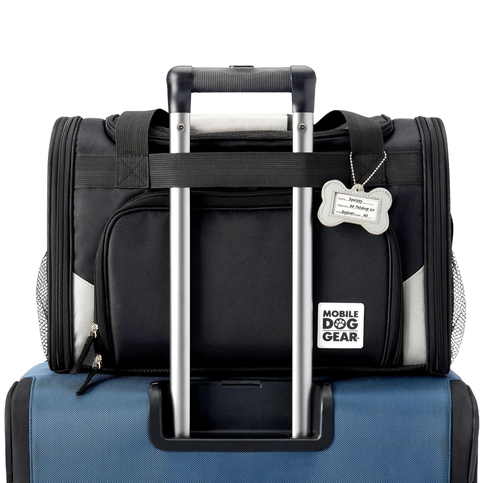 Mobile Dog Gear Pet Carrier Plus,"Black pet carrier attached to luggage handle with bone-shaped ID tag"