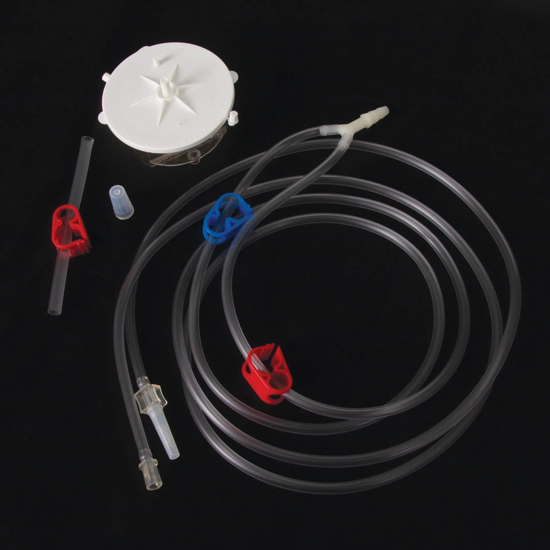 EZ Way Filter with Tubing,"Round white filter with clear tubing and red clamps"