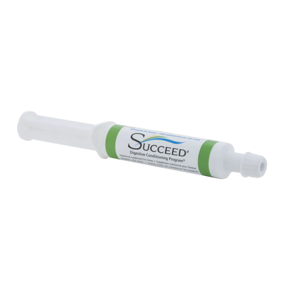 SUCCEED® DCP,"White oral paste syringe with green bands and cap"