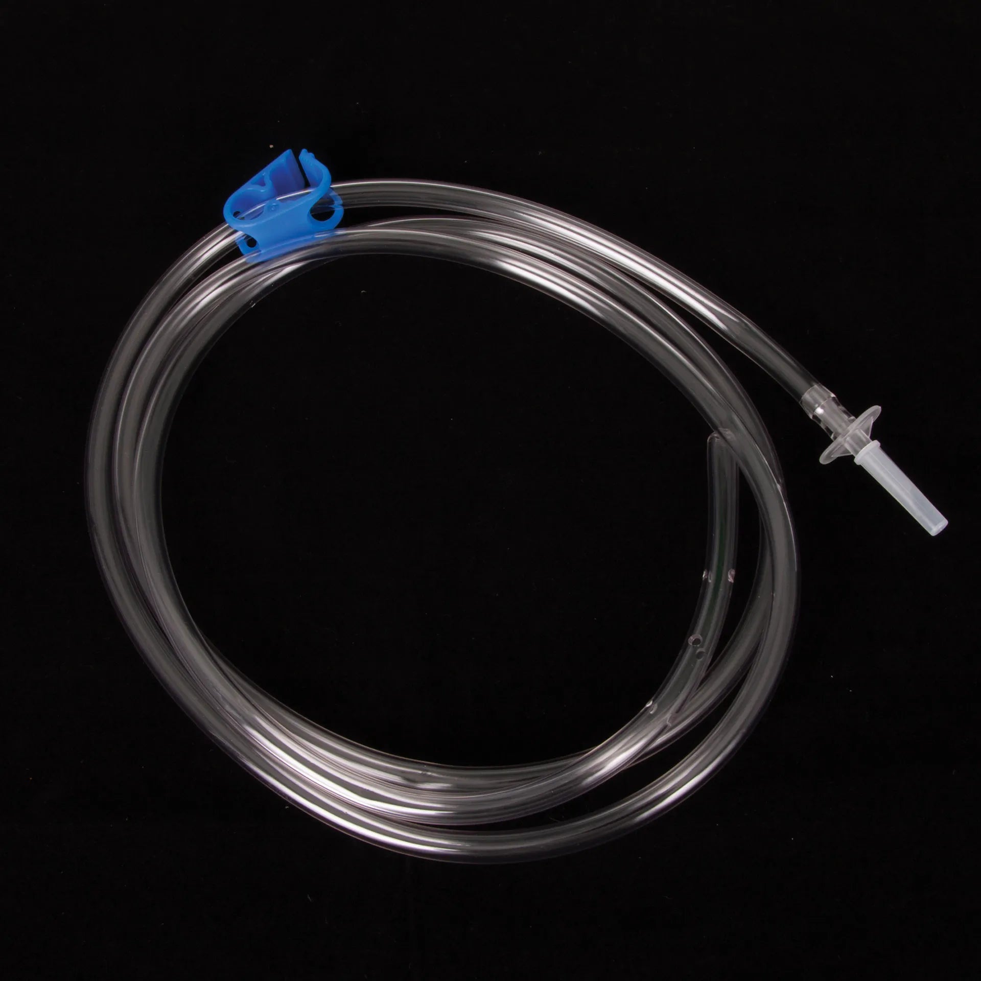 Uterine Flushing/Lavage Catheter,"Coiled clear tubing with blue clamp and white connector"