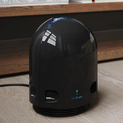 Airfree® Air Purifier,"Glossy black dome-shaped air purifier with front vents"