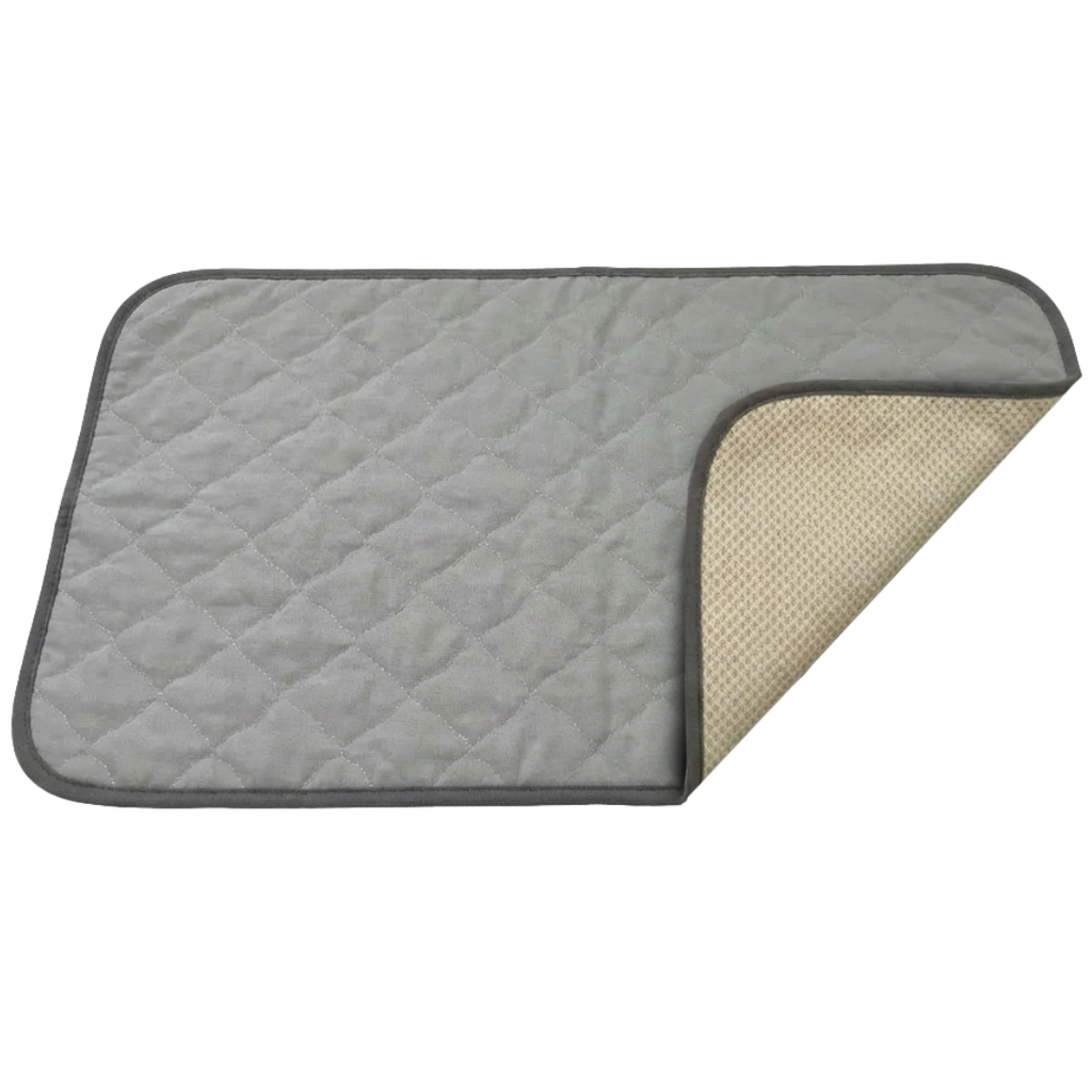 Puppywarmer Incubator Pee Pad,"Gray quilted pee pad with corner folded back"