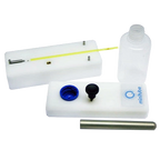 Manual Ball Sealer,"Disassembled clear bottle sealer with rods and caps"