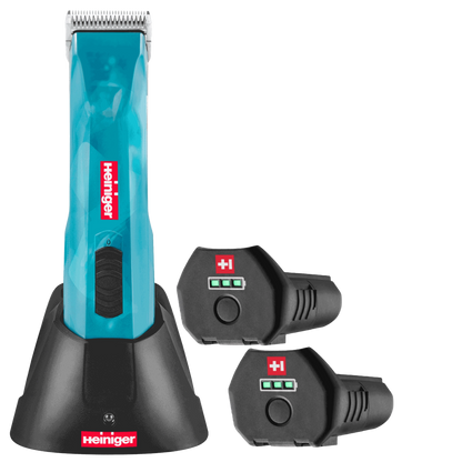 Opal Cordless Clipper and Free Blade,"Blue cordless clipper in charging base with two battery packs"