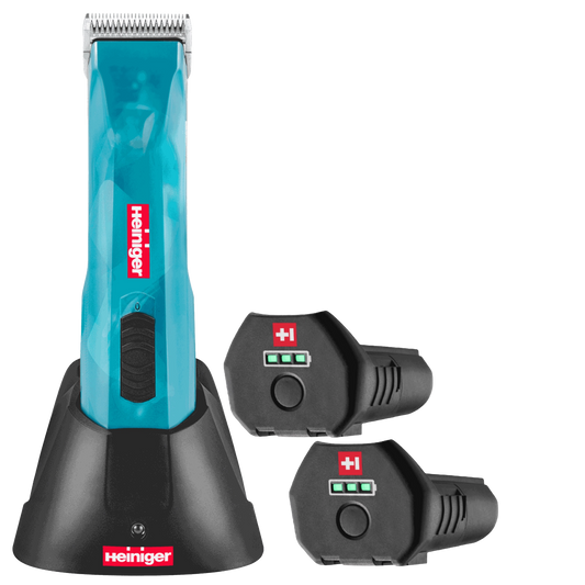 Opal Cordless Clipper and Free Blade,"Blue cordless clipper in charging base with two battery packs"