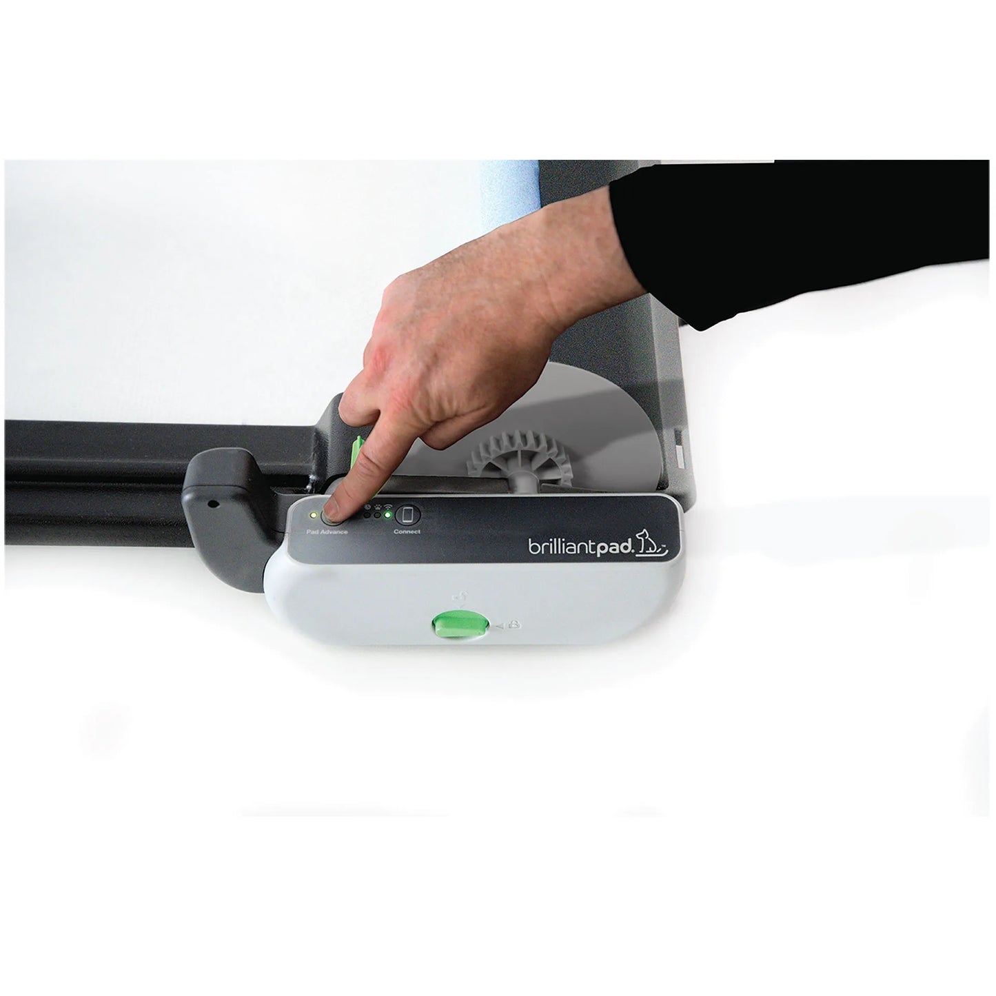 BrilliantPad Pro,"Hand pressing button on pad advance control unit"