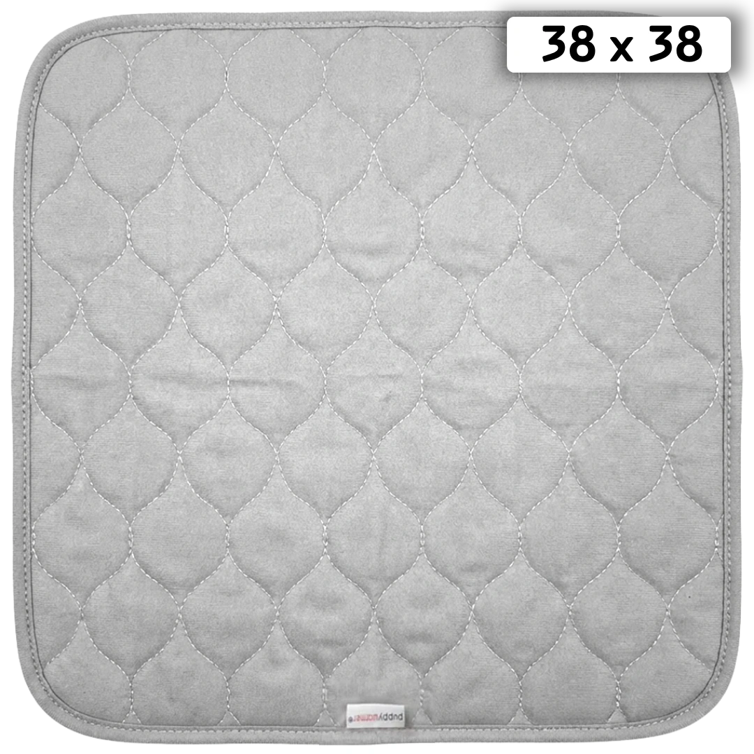 Puppywarmer Whelping Box Pad,"Gray quilted square pad with rounded corners"