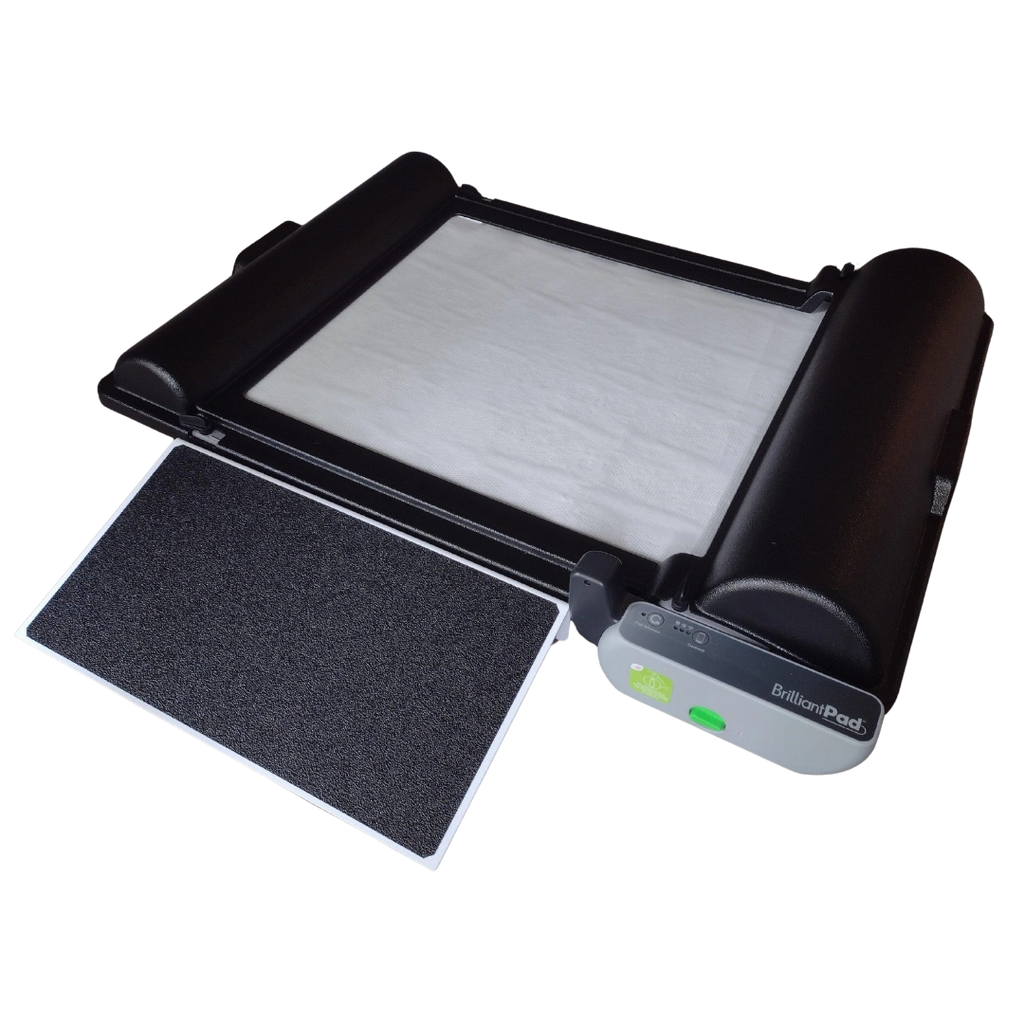 BrilliantPad Ramp,"Black ramp platform with white pad and removable tray"