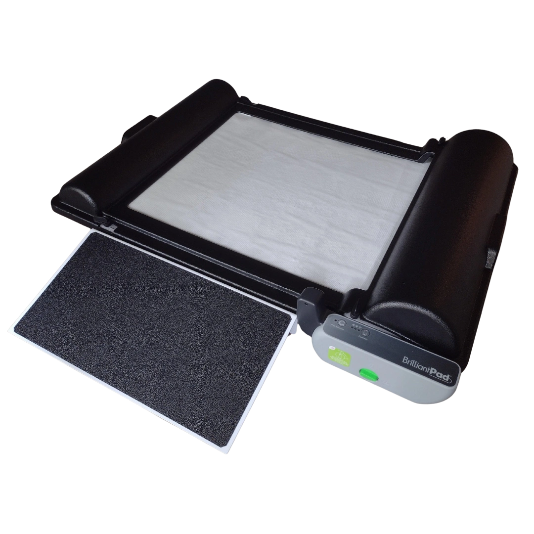 BrilliantPad Ramp,"Black ramp platform with white pad and removable tray"