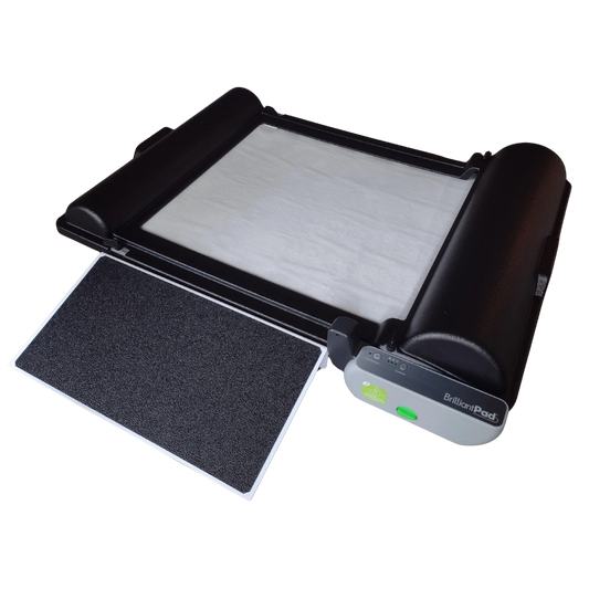 BrilliantPad Ramp,"Black ramp platform with white pad and removable tray"