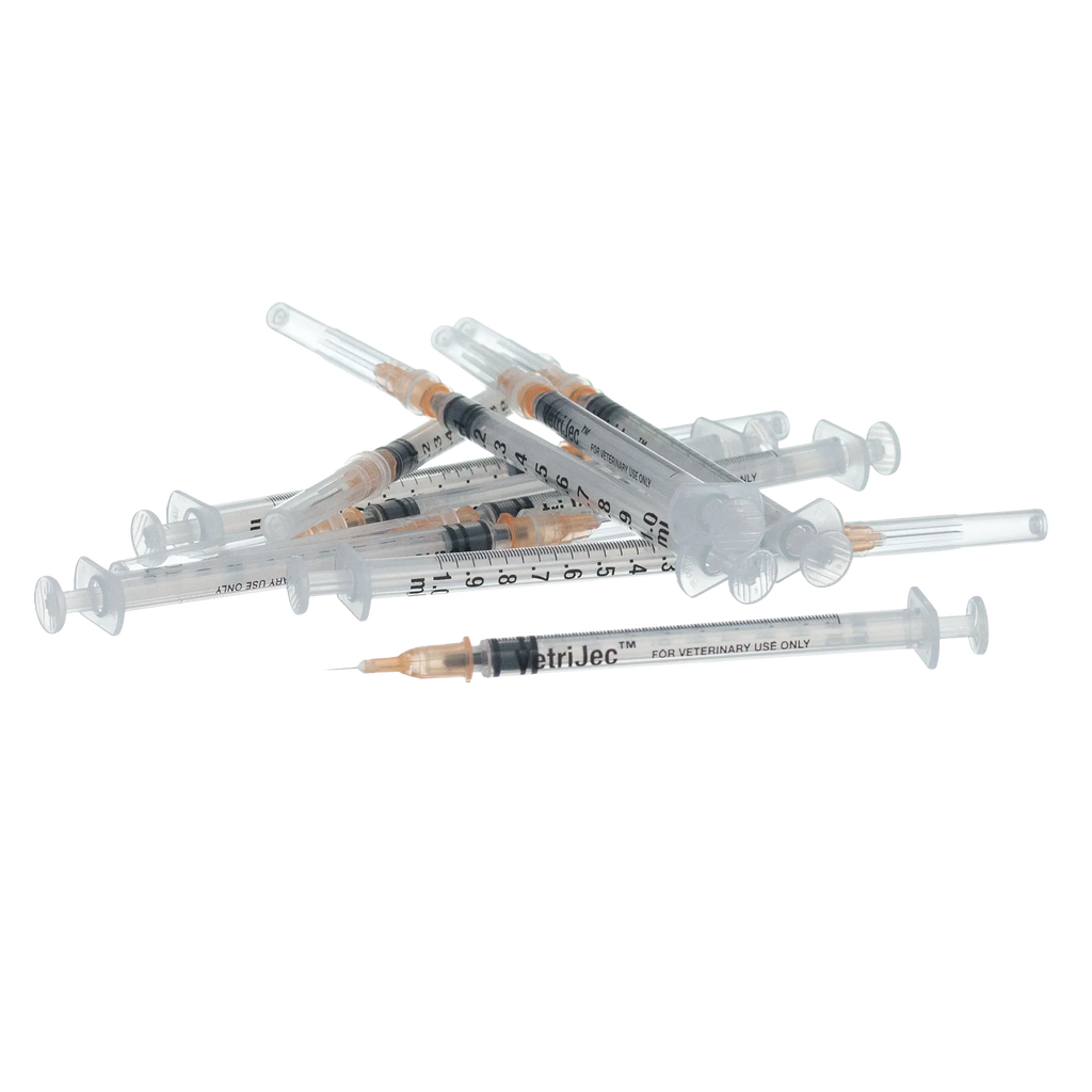 1cc VetriJec™ Syringes with 25 gauge Needles,"Pile of clear syringes with attached capped needles"