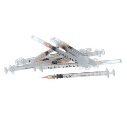 1cc VetriJec™ Syringes with 25 gauge Needles,"Pile of clear syringes with attached capped needles"