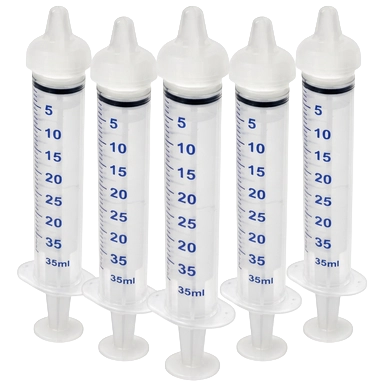 Puppywamer Latchons Syringe Nipple Feeders,"Five clear feeding syringes with white nipple tops"