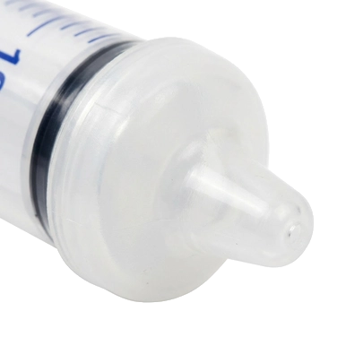 Puppywamer Latchons Syringe Nipple Feeders,"Close-up of clear syringe nipple tip"