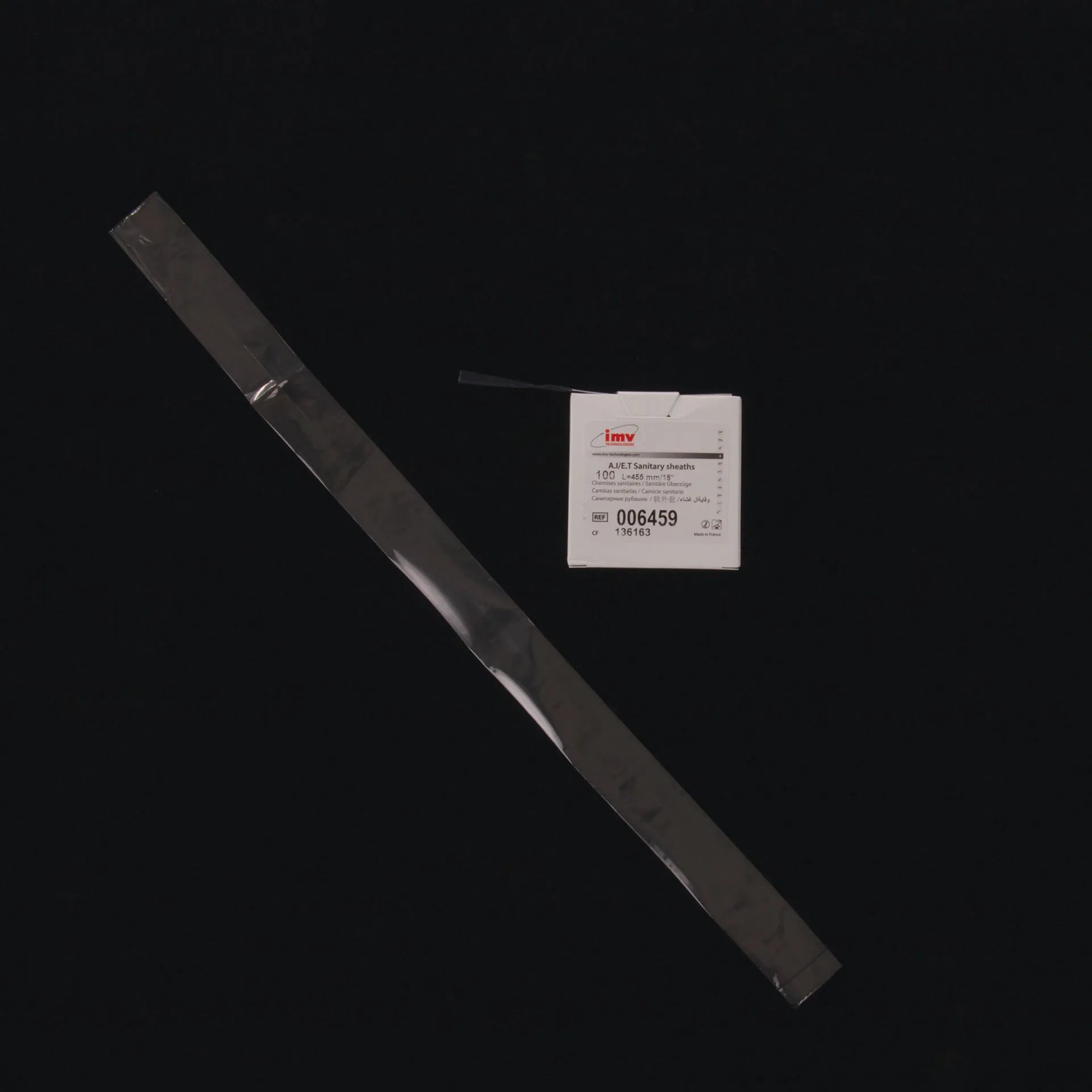 ET Chemise,"Long clear sheath with product box"