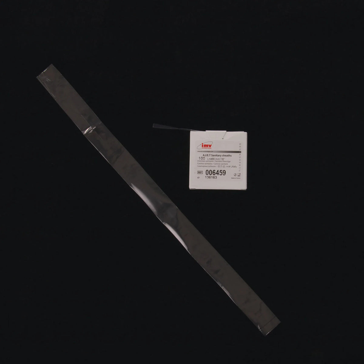 ET Chemise,"Long clear sheath with product box"