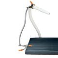 Groomers Third Arm,"Flexible dryer hose clipped to table edge"